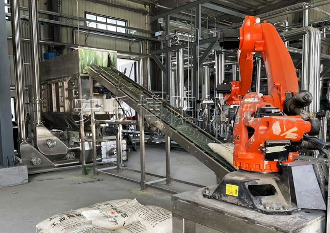 袋装硫磺粉全自动拆包机 机械手自动拆垛拆包成套方案